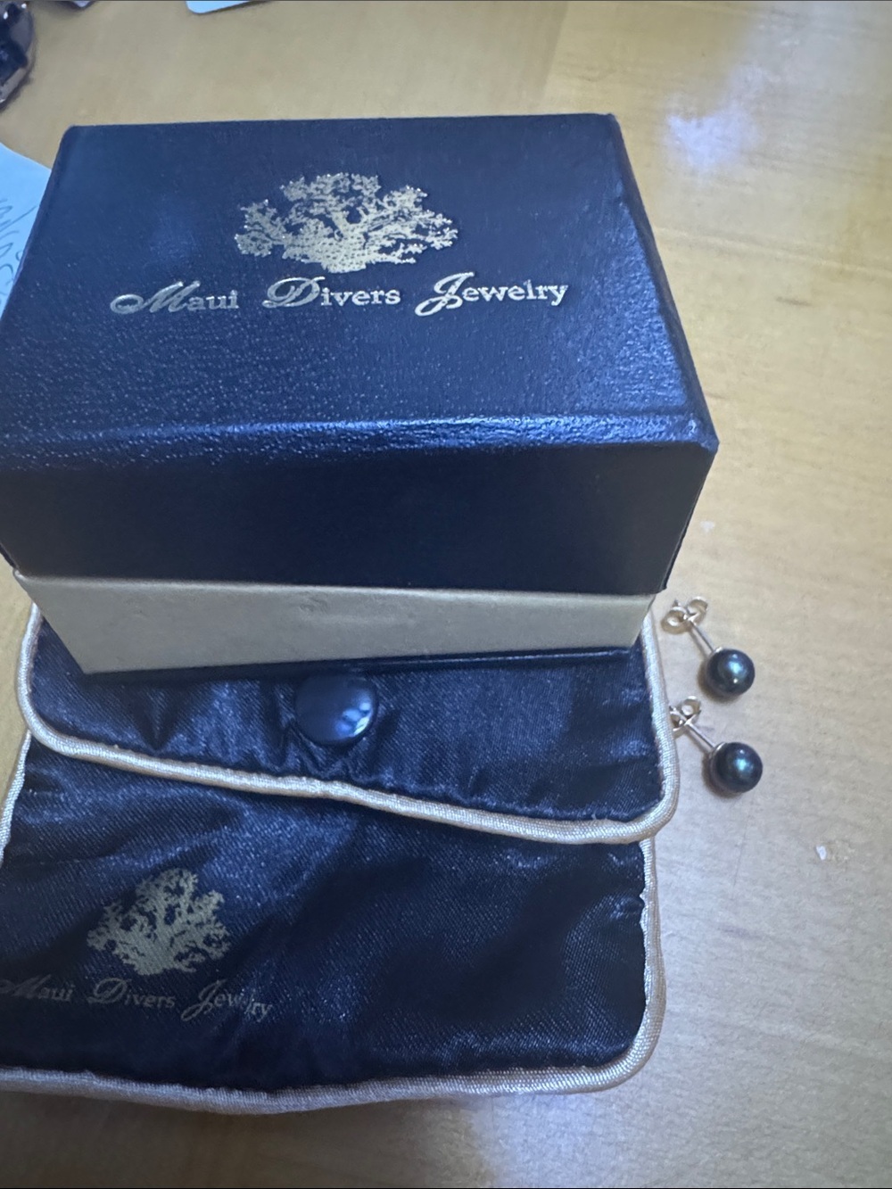 Maui divers Tahitian black pearl studs in gold